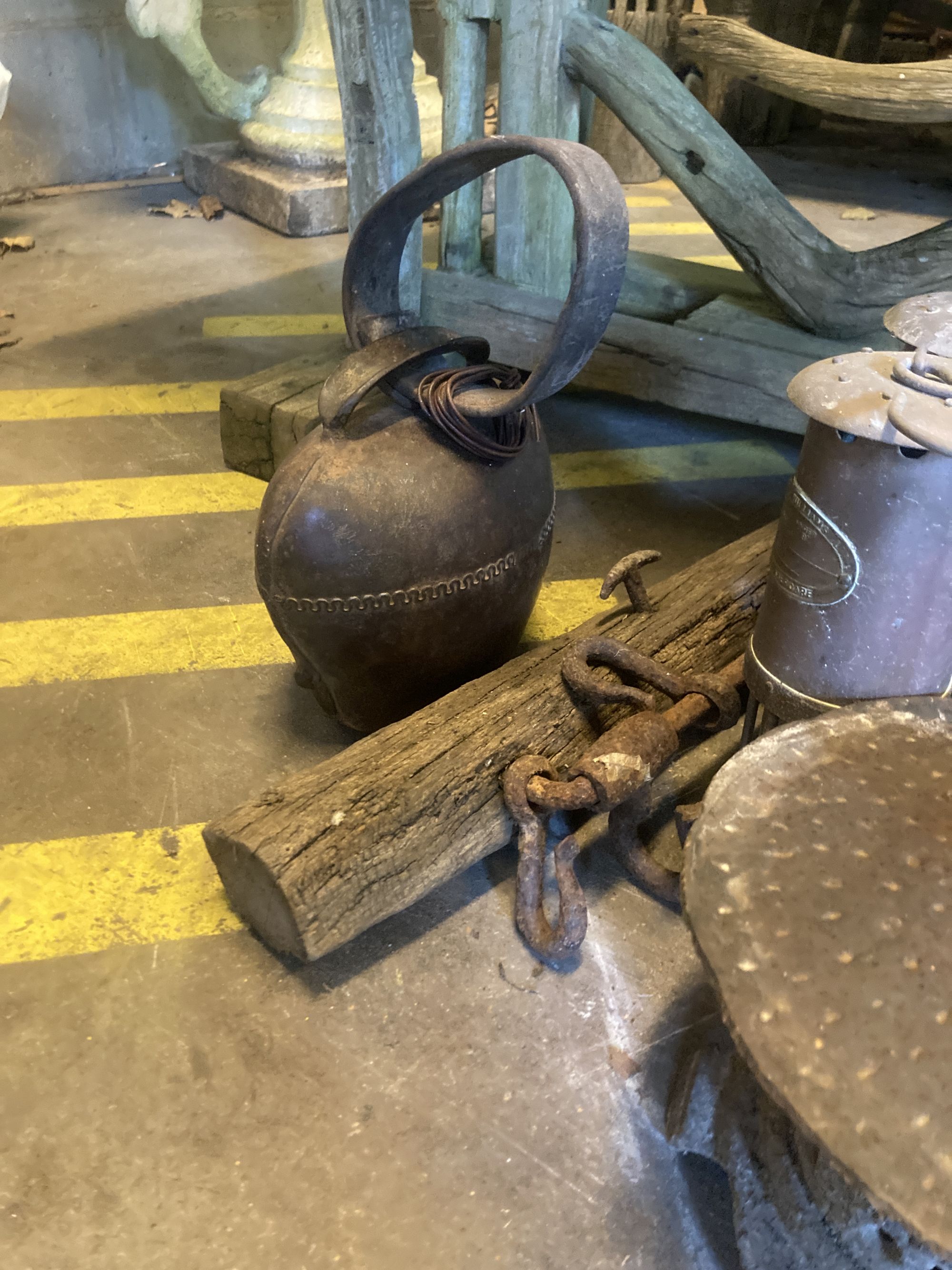 A quantity of Victorian and later metalware to include a cow bell, lanterns, miners lamps etc.